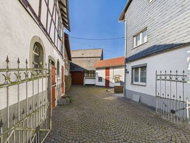 Haus zum Kauf 325.000 € 6 Zimmer 143 m² 1.010 m² Grundstück Niederlauken Weilrod 61276