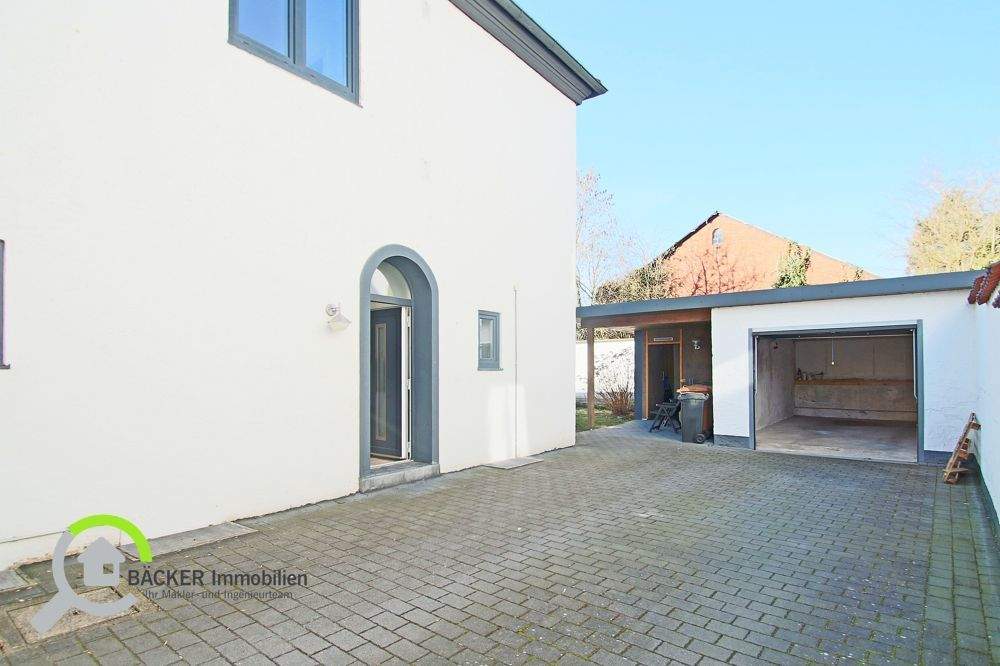 Immobilie in Lemförde - Vielseitiges Wohn- und Geschäftshaus mit Garten und Garage in zentraler Lage von Lemförde - Bild 1