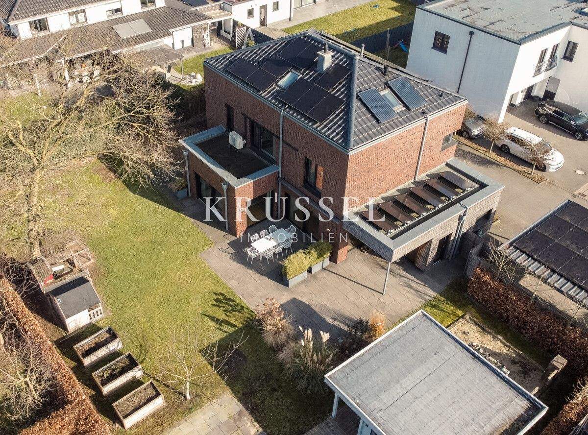 Immobilie in Lünne - NEU: Modernes Architektenhaus mit PV-Anlage, Saunahaus und Doppelgarage auf 1.015 m² Grundstück - Bild 1