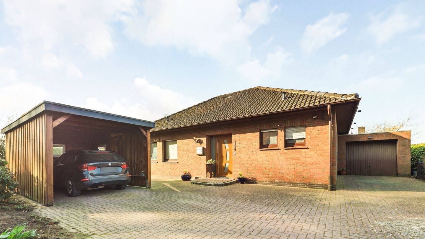 Immobilie in Twistringen - Bungalow mit Garage mitten im Grünen - Bild 0