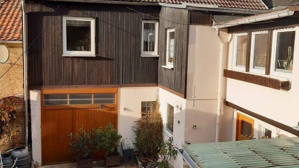 Reihenmittelhaus zum Kauf 105.000 € 8 Zimmer 133 m² 440 m² Grundstück Schkölen 07619