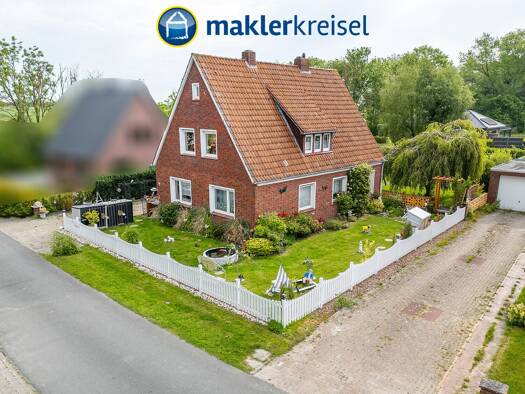 Einfamilienhaus zum Kauf 209.000 € 6 Zimmer 124,5 m² 933 m² Grundstück Tettens Wangerland 26434