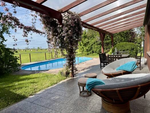 Einfamilienhaus zum Kauf 530.000 € 6,5 Zimmer 240 m² 1.424 m² Grundstück Minsen Wangerland 26434
