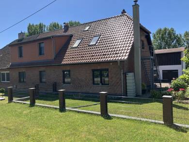 Doppelhaushälfte zum Kauf 160.000 € 5 Zimmer 100 m² 1.353 m² Grundstück Wüstgrabow Stavenhagen 17153