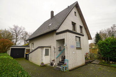 Mehrfamilienhaus zum Kauf 390.000 € 5 Zimmer 149 m² 1.224 m² Grundstück frei ab sofort Hollen Gütersloh / Hollen 33334