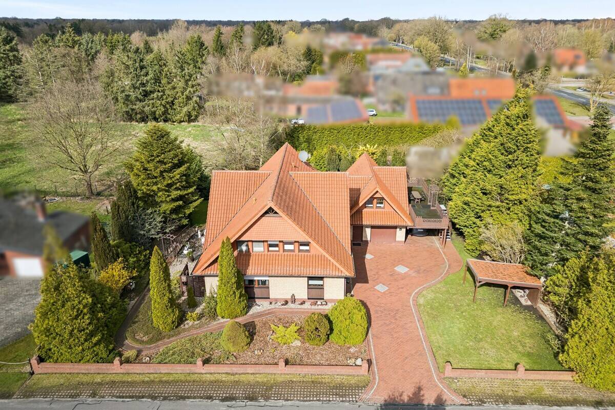 Immobilie in Ostrhauderfehn - "Großzügiges Einfamilienhaus mit Einliegerwohnung und traumhaftem Süd-West-Garten in Idafehn" - Bild 1
