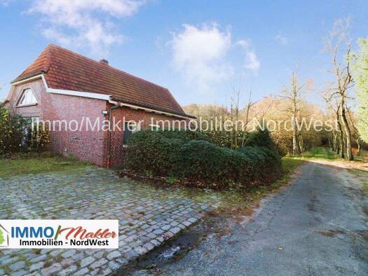 Einfamilienhaus zum Kauf 265.000 € 5 Zimmer 211,6 m² 4.024 m² Grundstück Baumstraße 6 Blersum Wittmund 26409