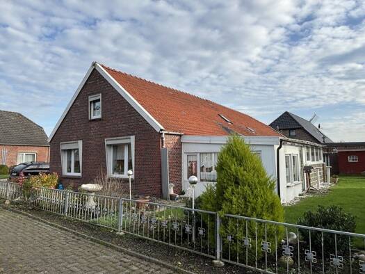 Einfamilienhaus zum Kauf 129.000 € 6 Zimmer 151 m² 592 m² Grundstück Berdum Wittmund 26409