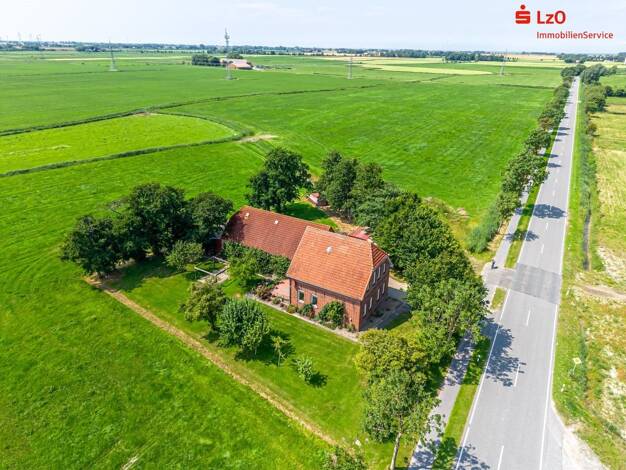 Einfamilienhaus zum Kauf 235.000 € 9 Zimmer 187,7 m² 1.990 m² Grundstück Hohenkirchen Wangerland 26434