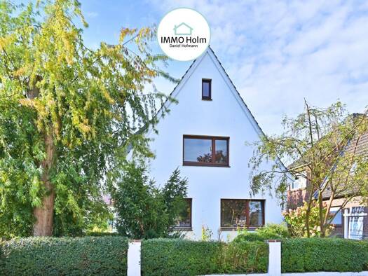 Einfamilienhaus zum Kauf 450.000 € 6 Zimmer 137 m² 1.003 m² Grundstück Wedel 22880
