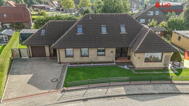 Einfamilienhaus zum Kauf 290.000 € 8 Zimmer 216 m² 829 m² Grundstück Hohenkirchen Wangerland 26434