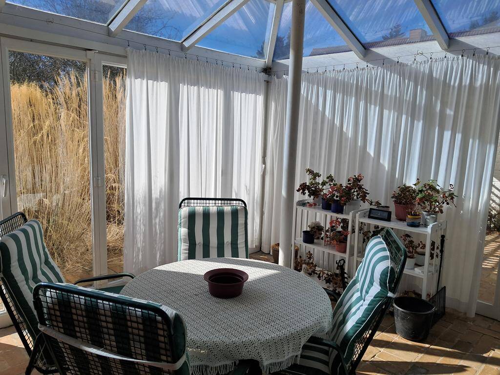 Immobilie in Stapel - Bungalow mit wunderschönem Garten, Kamin, Wintergarten, Terrasse und Garage mit E-Ladepunkt - Bild 1