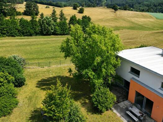 Immobilie in Grub - Haus zum Kauf - Grub - 690.000 € - 5,5 Zimmer, 150,9 m², 1.020 m² Grundstück - Bild 1