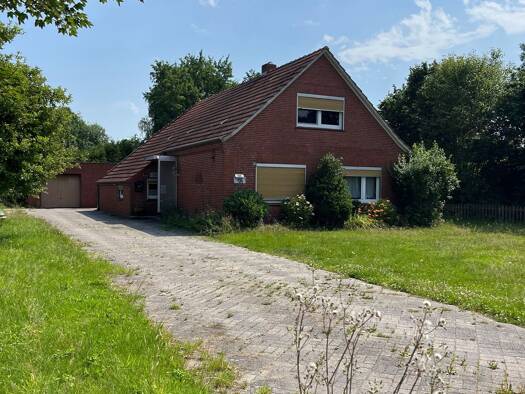 Einfamilienhaus zum Kauf 219.000 € 5 Zimmer 160 m² 1.774 m² Grundstück frei ab sofort Königsstraße 124 Warsingsfehn Moormerland 26802
