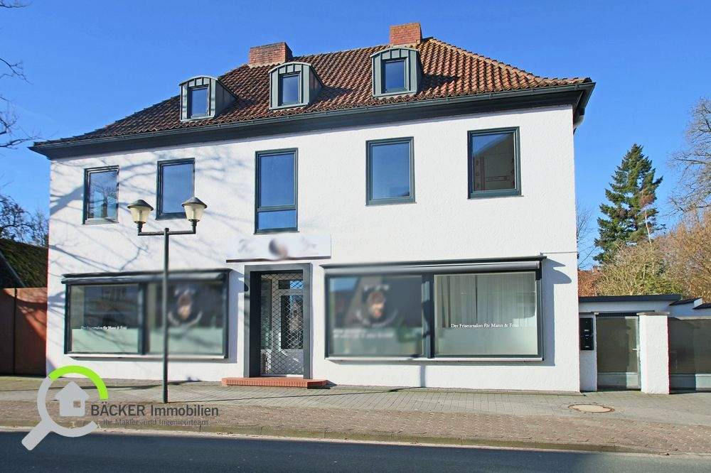 Immobilie in Lemförde - Vielseitiges Wohn- und Geschäftshaus mit Garten und Garage in zentraler Lage von Lemförde - Bild 0