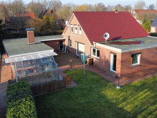 Einfamilienhaus zum Kauf 379.000 € 8 Zimmer 192 m² 904 m² Grundstück Hooksiel Wangerland 26434