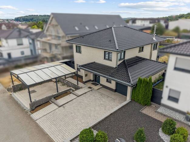 Einfamilienhaus zum Kauf 639.000 € 5 Zimmer 156 m² 657 m² Grundstück Reiskirchen Reiskirchen 35447