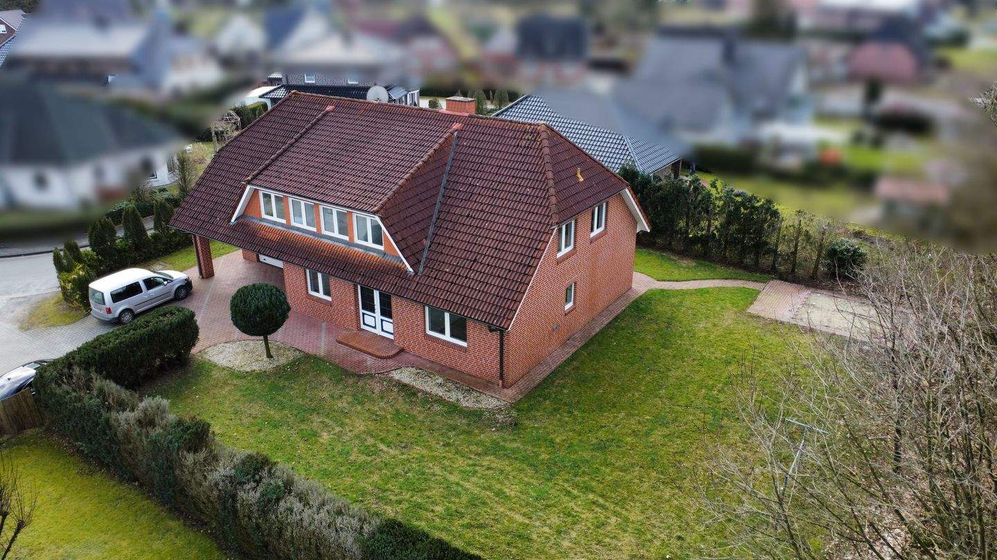 Immobilie in Börger - Siedlungslage! Großes Einfamilienhaus mit tollem Garten! - Bild 1