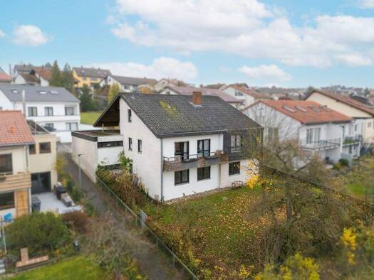 Einfamilienhaus zum Kauf 690.000 € 7 Zimmer 186 m² 595 m² Grundstück Höchberg 97204