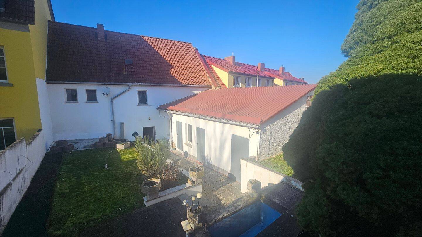 Immobilie in Mücheln (Geiseltal) - Reihenmittelhaus mit Nebengelass unweit vom Geiseltalsee - Bild 0