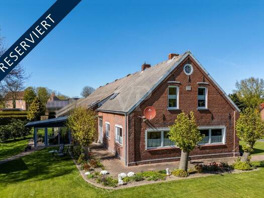 Bauernhaus zum Kauf 450.000 € 10 Zimmer 340 m² 2.652 m² Grundstück Roggenstede Dornum 26553