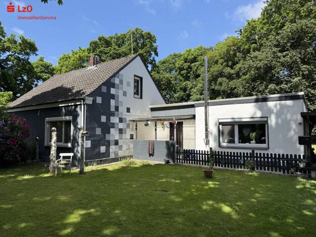 Mehrfamilienhaus zum Kauf 185.000 € 6 Zimmer 151,6 m² 1.764 m² Grundstück Ostiem Schortens 26419
