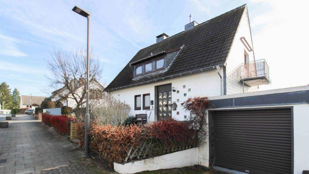 Einfamilienhaus zum Kauf 539.000 € 6 Zimmer 125,3 m² 705,2 m² Grundstück Mitte Heiligenhaus 42579