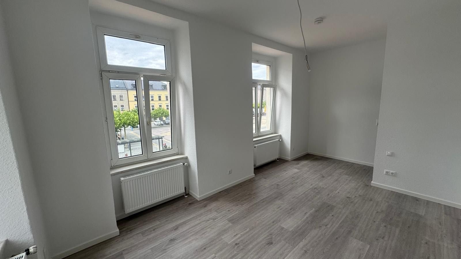 Wohnung zur Miete 580 € 4 Zimmer 83 m²<br/>Wohnfläche 1.<br/>Geschoss ab sofort<br/>Verfügbarkeit Oelsnitz Oelsnitz 08606