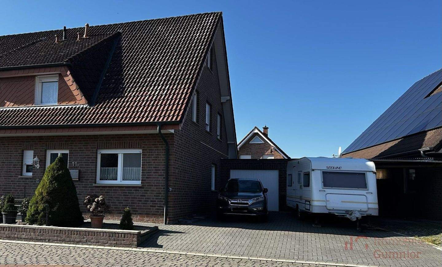 Immobilie in Salzbergen - IMMOBILIEN GUMNIOR präsentiert: familienfreundliche Doppelhaushälfte in beliebter Lage von Salzbergen - Bild 1