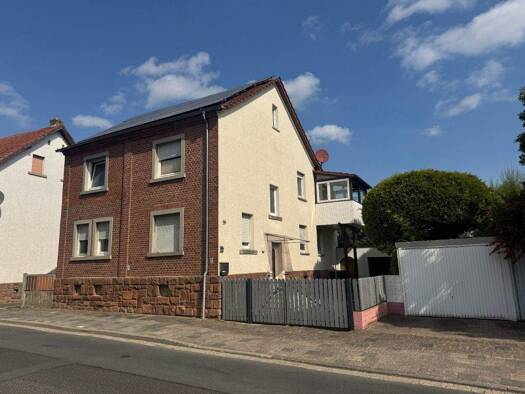 Mehrfamilienhaus zum Kauf 399.900 € 9 Zimmer 200 m² 461 m² Grundstück Ostheim Nidderau 61130