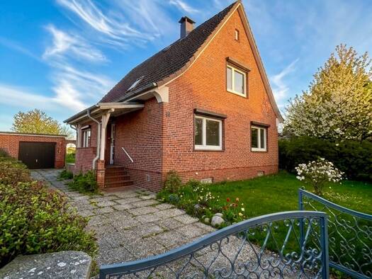 Haus zum Kauf 475.000 € 4 Zimmer 135 m² 989 m² Grundstück Borstel-Hohenraden 25494
