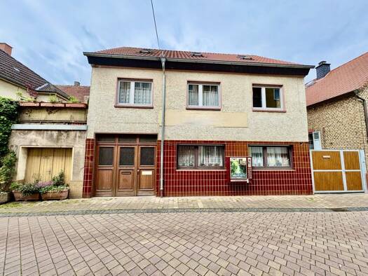 Einfamilienhaus zum Kauf 359.000 € 10 Zimmer 214,3 m² 194 m² Grundstück Nackenheim 55299