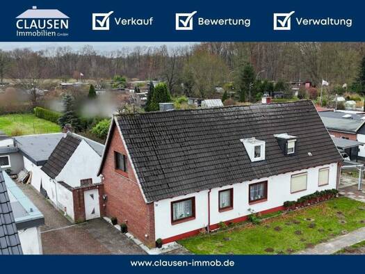 Doppelhaushälfte zum Kauf 229.000 € 5 Zimmer 91,2 m² 970 m² Grundstück Wittorf Neumünster 24539