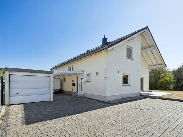 Einfamilienhaus zum Kauf 425.000 € 7 Zimmer 169,7 m² 694 m² Grundstück Katzenfurt Ehringshausen 35630