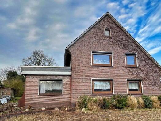 Mehrfamilienhaus zum Kauf 279.000 € 11 Zimmer 282 m² 980 m² Grundstück frei ab sofort Sande 26452