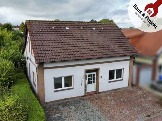 Einfamilienhaus zum Kauf 119.000 € 6 Zimmer 135 m² 483 m² Grundstück Carolinensiel Wittmund 26409