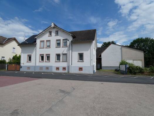 Mehrfamilienhaus zum Kauf als Kapitalanlage geeignet 690.000 € 6 Zimmer 134 m² 856 m² Grundstück Weißkirchen Oberursel 61440