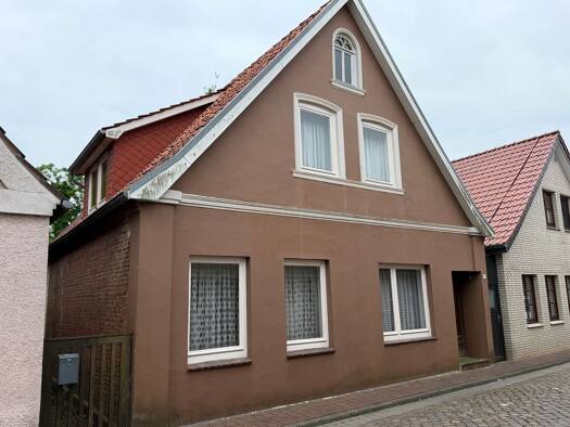 Einfamilienhaus zum Kauf 149.000 € 6 Zimmer 129 m² 317 m² Grundstück Poststraße 37 Neuhaus 21785