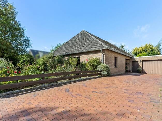 Bungalow zum Kauf 295.000 € 4 Zimmer 128 m² 1.161 m² Grundstück Dorum Wurster Nordseeküste 27639