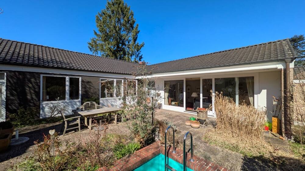 Immobilie in Hatten - Gepflegter Bungalow mit viel Platz auf großem Grundstück  in ruhiger und zentraler Lage in Sandkrug - Bild 1