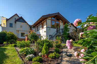 Haus zum Kauf 398.500 € 11 Zimmer 220 m² 1.040 m² Grundstück Bonbaden Braunfels 35619