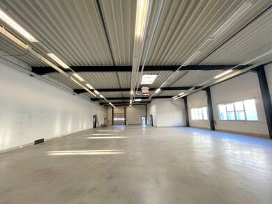 Produktionshalle zur Miete 6,66 € 750 m² Lagerfläche Hochdorf Freiburg 79108