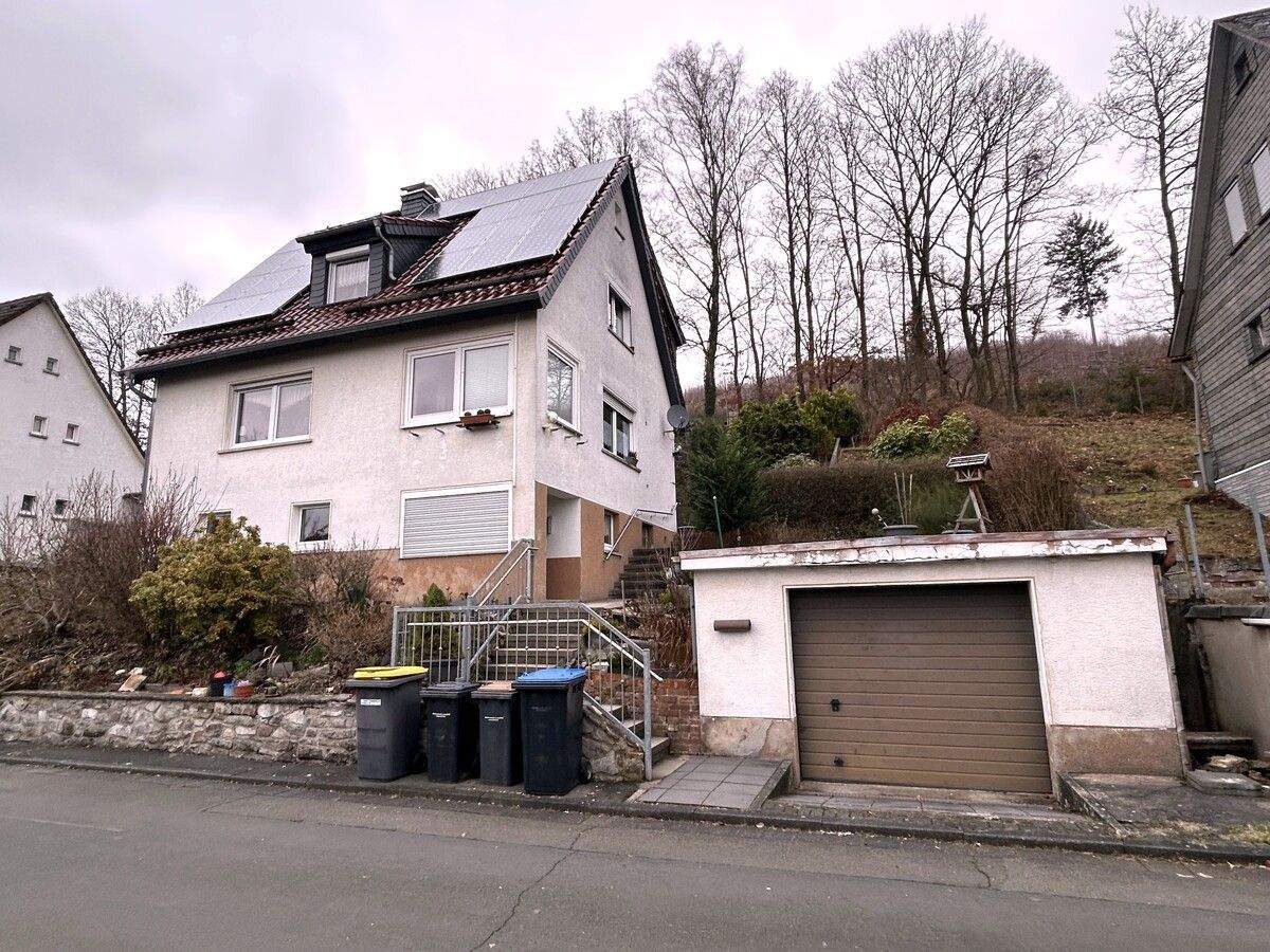 Immobilie in Dietzhölztal - Ewersbach: Siedlungshaus in schöner Wohnlage! - Bild 0