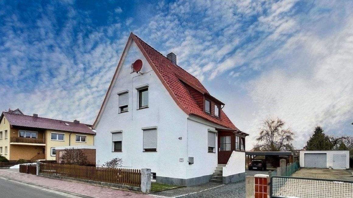 Immobilie in Katlenburg-Lindau - Gemütliches Einfamilienhaus mit Doppelcarport und großem Garten! - Bild 0