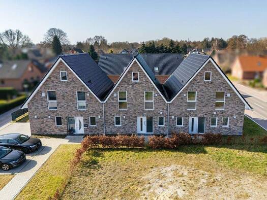 Reihenmittelhaus zur Miete - Erstbezug 1.500 € 4 Zimmer 97 m² 185 m² Grundstück Sievekestraße 7 Warsingsfehn Moormerland / Warsingsfehn 26802