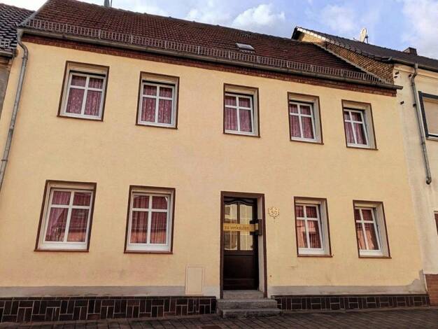 Reihenmittelhaus zum Kauf provisionsfrei 85.000 € 6 Zimmer 140 m² 1.128 m² Grundstück Burgstraße 50 Zahna Zahna-Elster 06895