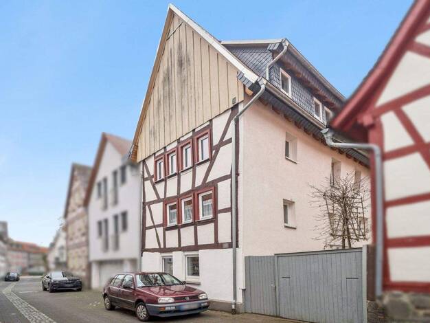 Einfamilienhaus zum Kauf 314.500 € 7 Zimmer 140 m² 147 m² Grundstück Lich 35423