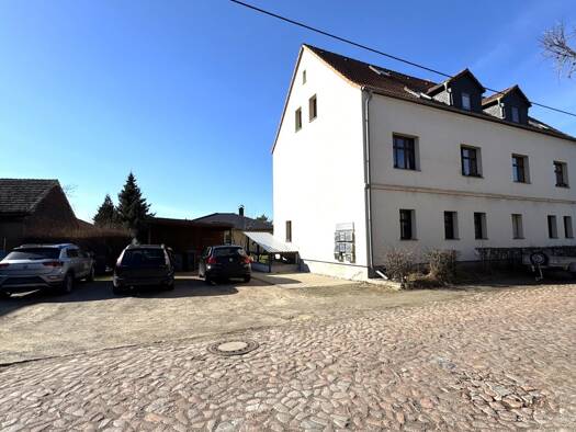 Mehrfamilienhaus zum Kauf als Kapitalanlage geeignet 415.000 € 311 m² 559 m² Grundstück Apollensdorf Lutherstadt Wittenberg 06886