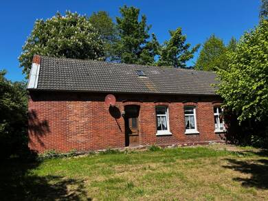 Einfamilienhaus zum Kauf 145.000 € 7 Zimmer 160 m² 2.010 m² Grundstück Arle Großheide / Arle 26532