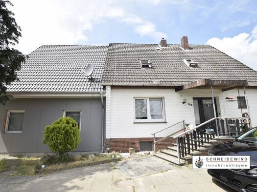 Einfamilienhaus zum Kauf 340.000 € 7 Zimmer 198,4 m² 874 m² Grundstück Stuhr 28816